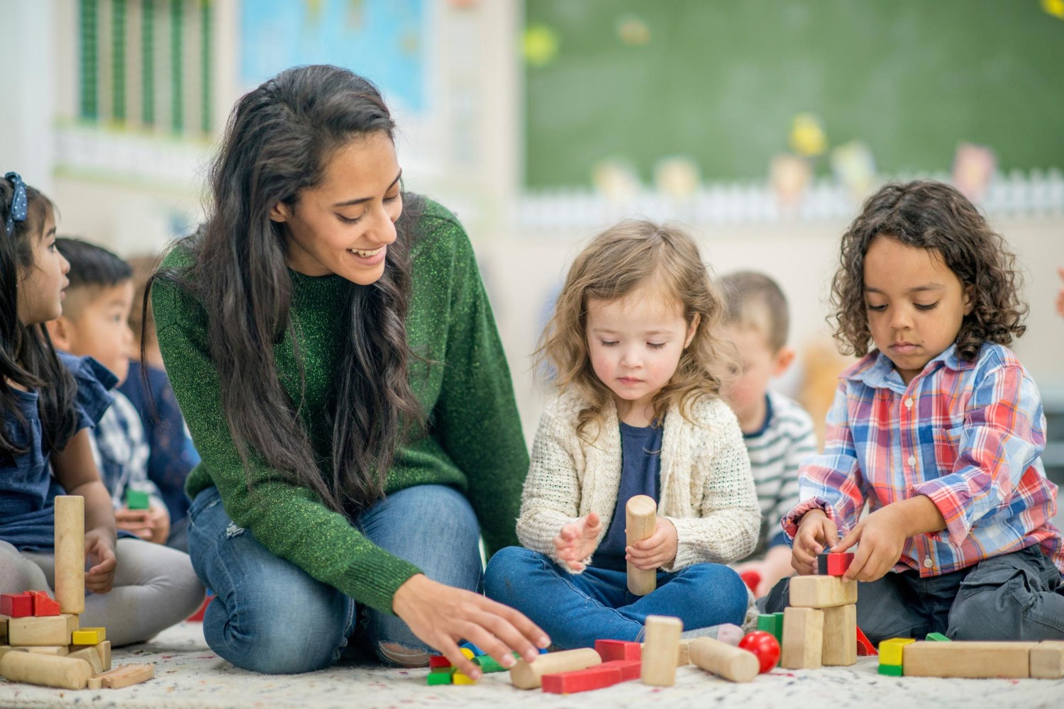 Teacher with children